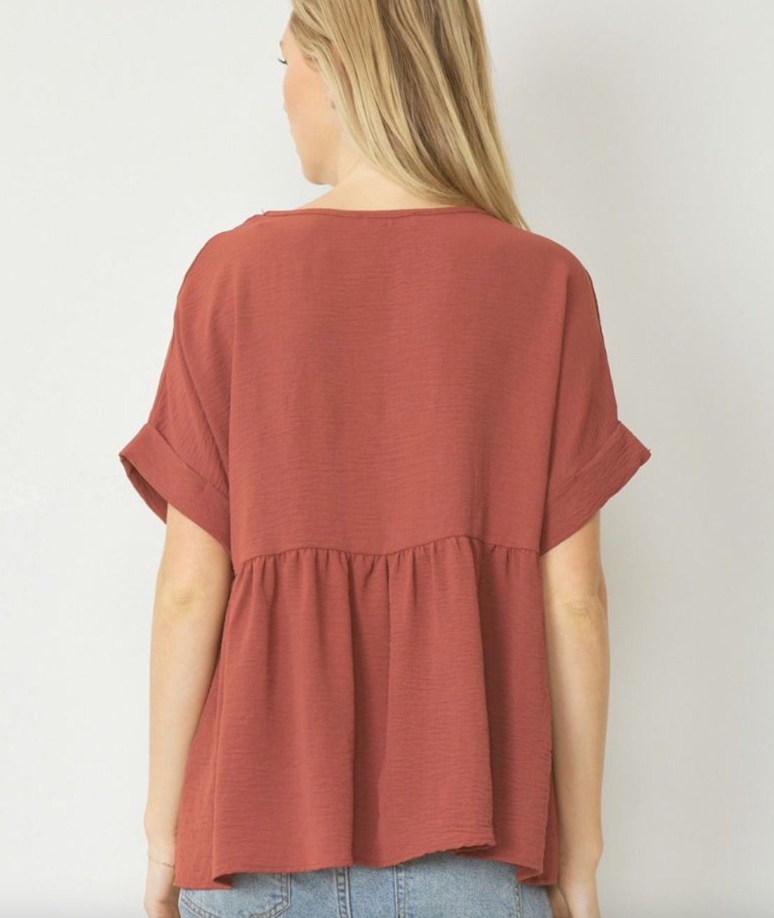 Entro Solid V-neck babydoll top featuring rolled short sleeve band finish Red Brown