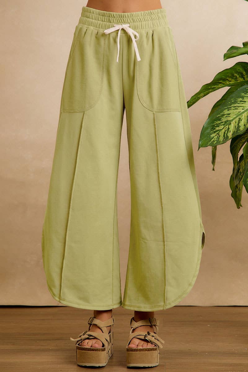 FRENCH TERRY OUT SEAM DETAIL TULIP HEM PANTS