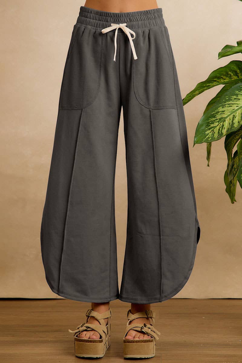 FRENCH TERRY OUT SEAM DETAIL TULIP HEM PANTS