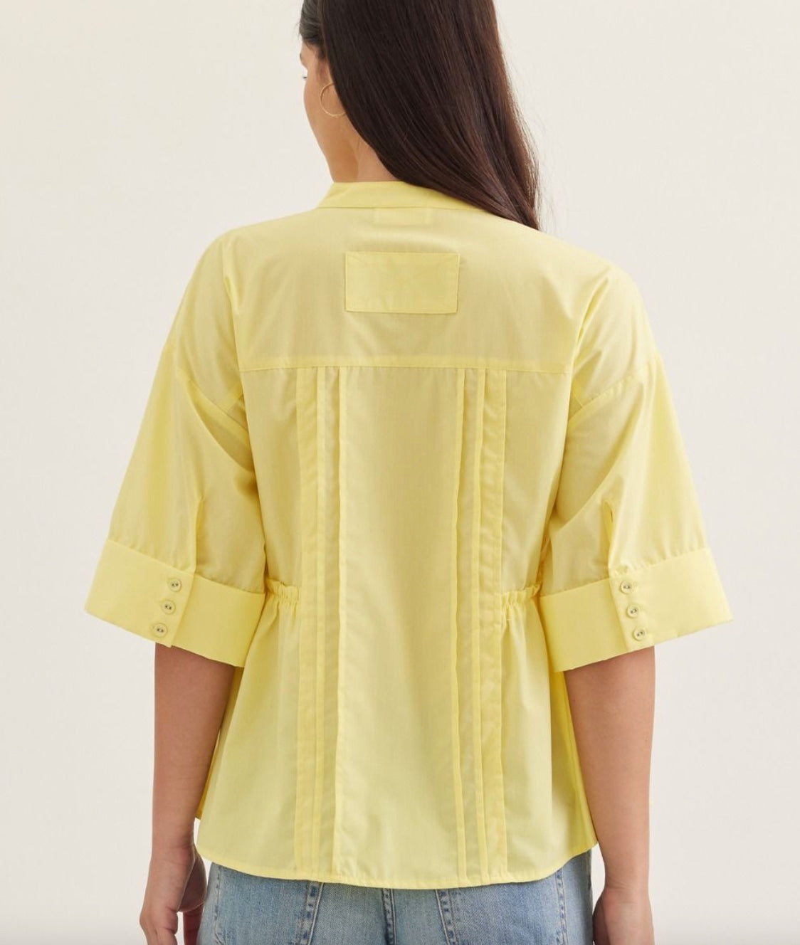 Entro Solid Cuffed Short Sleeve Top Featuring Pleated Front Panel Button Closure in Yellow