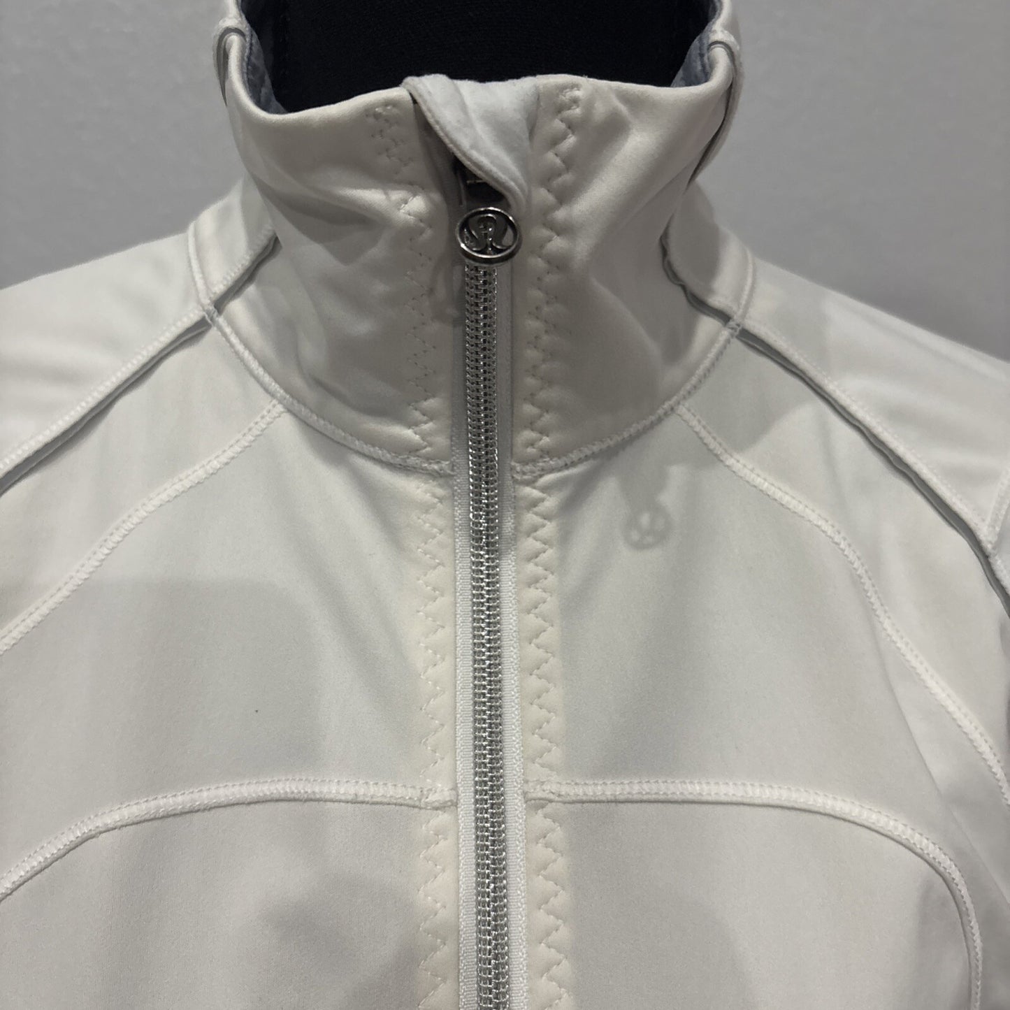 Lululemon white zip up jacket Size 6